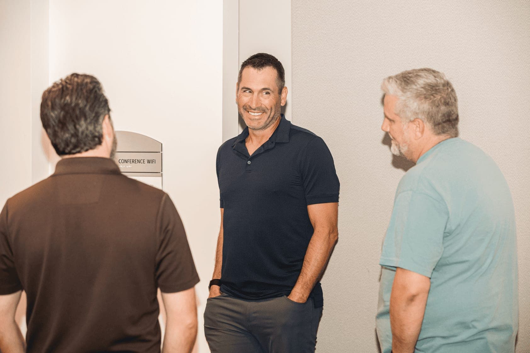 A one-on-one conversation between attendees at a Franchise Accelerator event